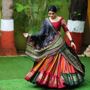 Complimentary Multi Colour Soft Butter Silk Material Designer Lehenga Choli With Red Dupatta