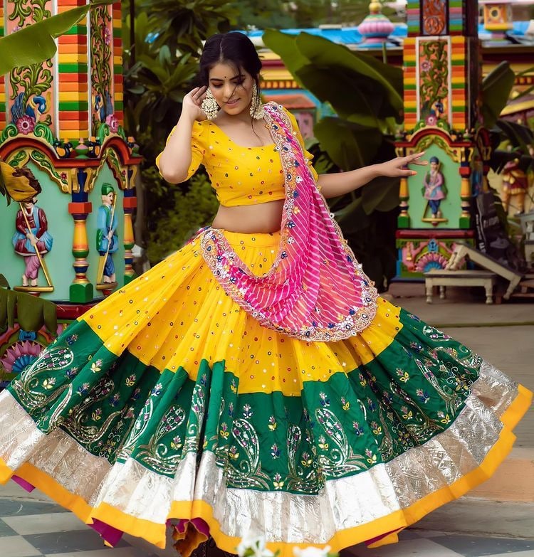 Navratri ghaghra choli in butter silk fabric with mirror work choli and dupatta