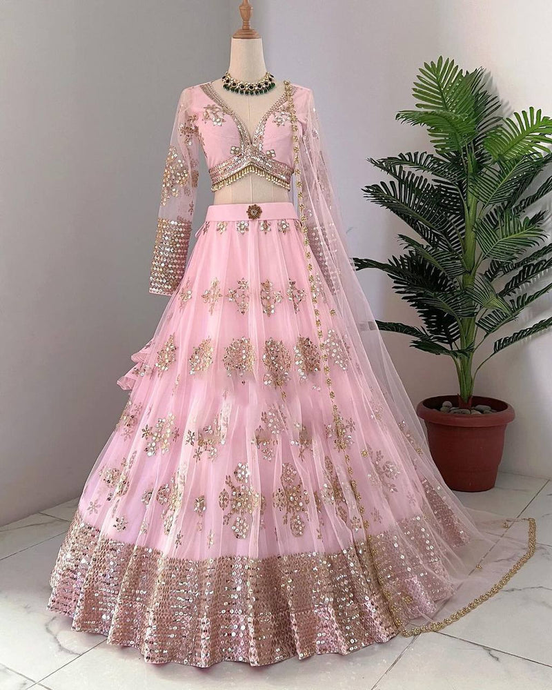 Baby Pink Stunning Double layer Net lehenga With Peplum style blouse