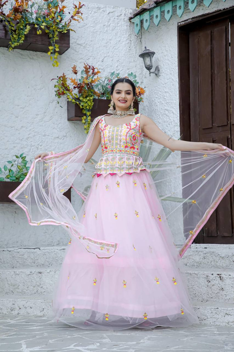 Baby Pink Stunning Double layer Net lehenga With Peplum style blouse