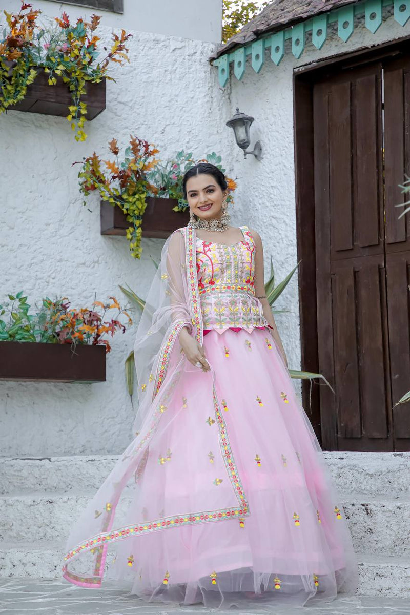 Baby Pink Stunning Double layer Net lehenga With Peplum style blouse