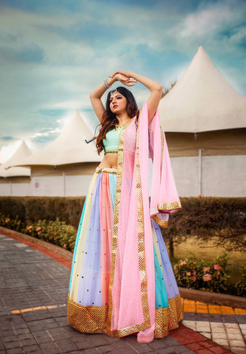 Multi Color Stunning Double layer Net lehenga With Peplum style blouse