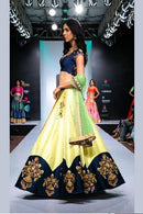 Yellow Heavy Embroidered Party Wear Lehenga